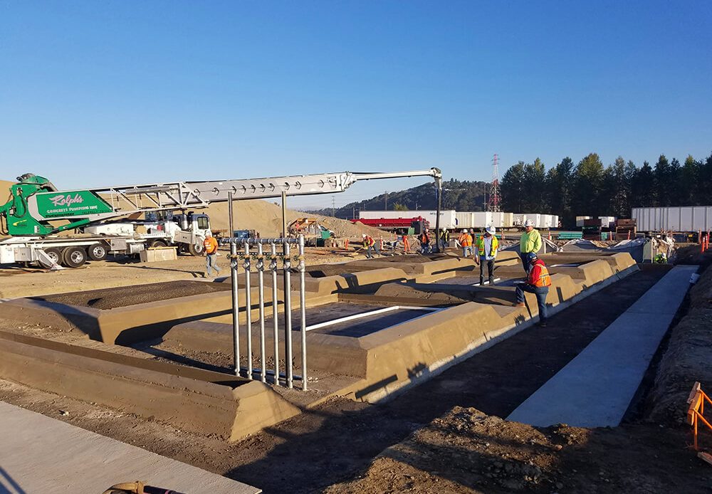 General Mechanical crew performing general contracting work on an active construction site